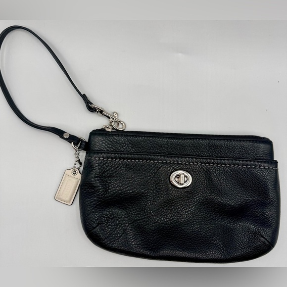 Coach Handbags - Coach Black Leather Turn lock Wristlet | Very Good Condition